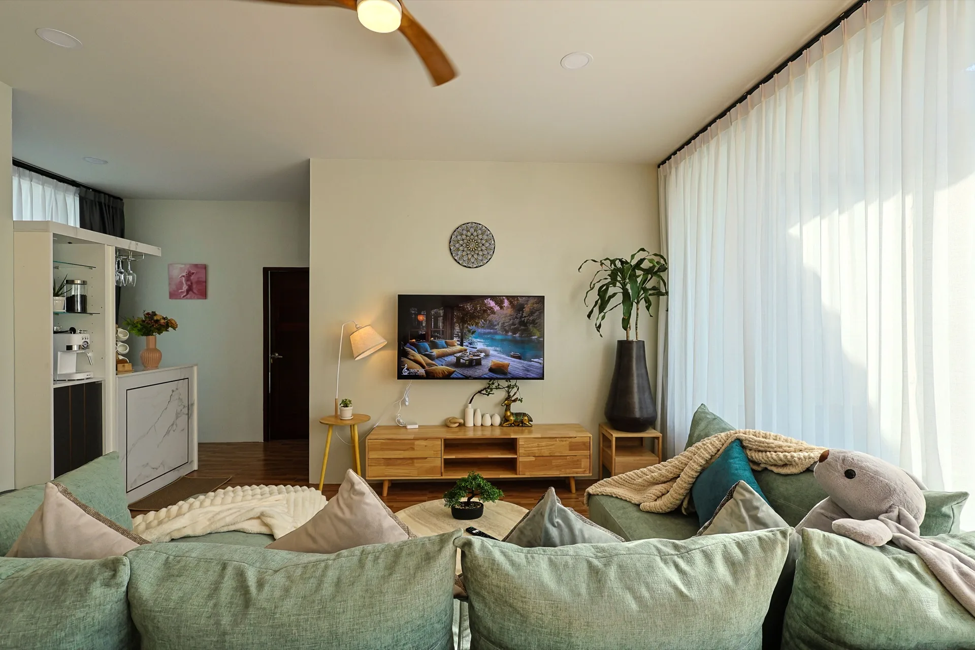 Living room with sofa and view to the garden